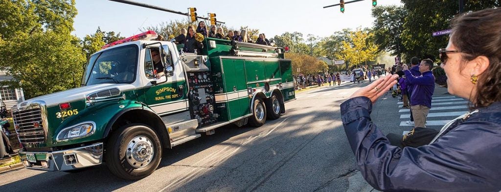 Simpson Rural Fire Department truck carrying ECU students in the homecoming parade.